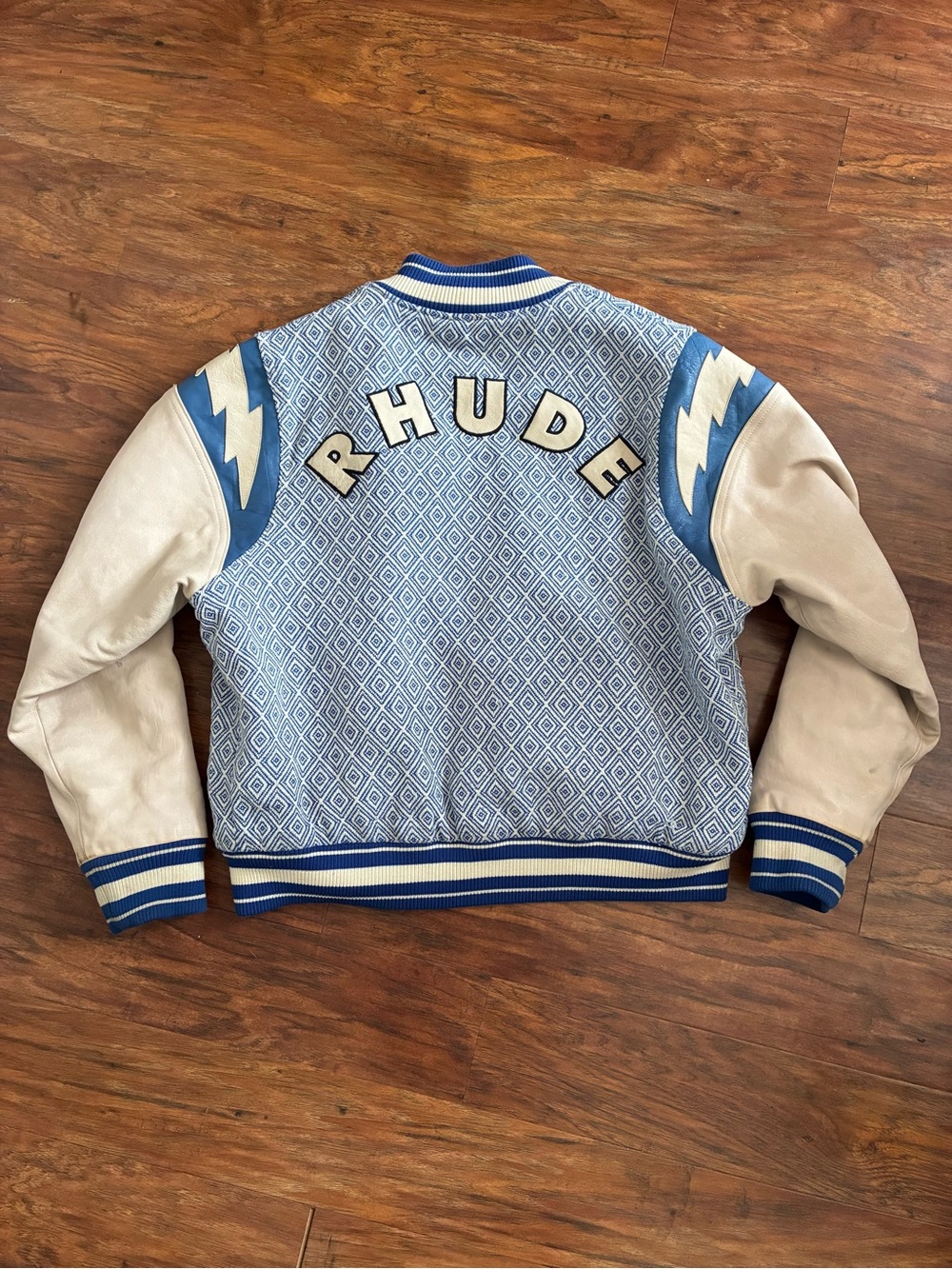 Rhude Light Blue & Cream Diamond-Pattern Varsity Jacket with Bold Back Lettering